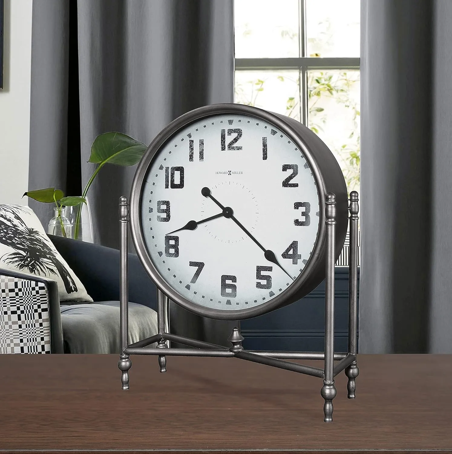Howard Miller South Haven Mantel Clock 547-486 – Light Charcoal Finished Metal Base, Round Metal Base, Flat Glass Crystal, Modern Home Décor, Quartz Movement