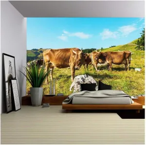 wall26 - Cows Grazing in a Typical Alpine Landscape - Removable Wall Mural | Self-Adhesive Large Wallpaper - 66x96 inches